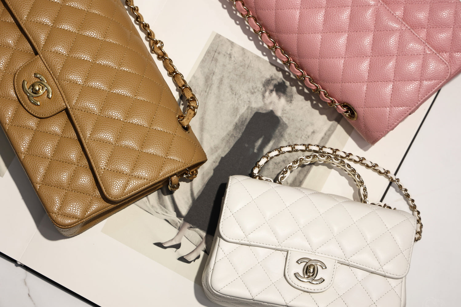 Chanel classic flap bags beige pink and white styling luxury editorial