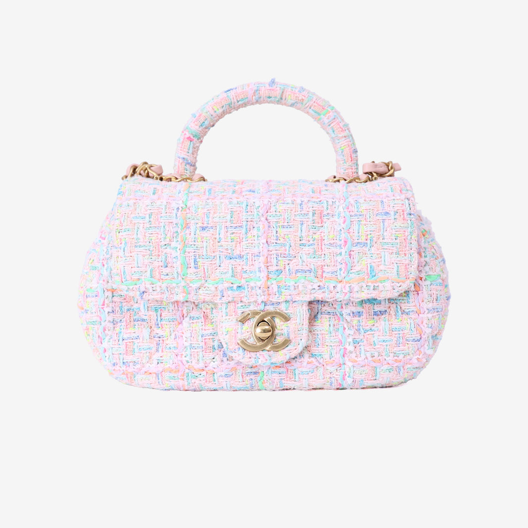 Chanel Mini Flap Bag with Top Handle in Pink Tweed Leather with Gold Hardware front view