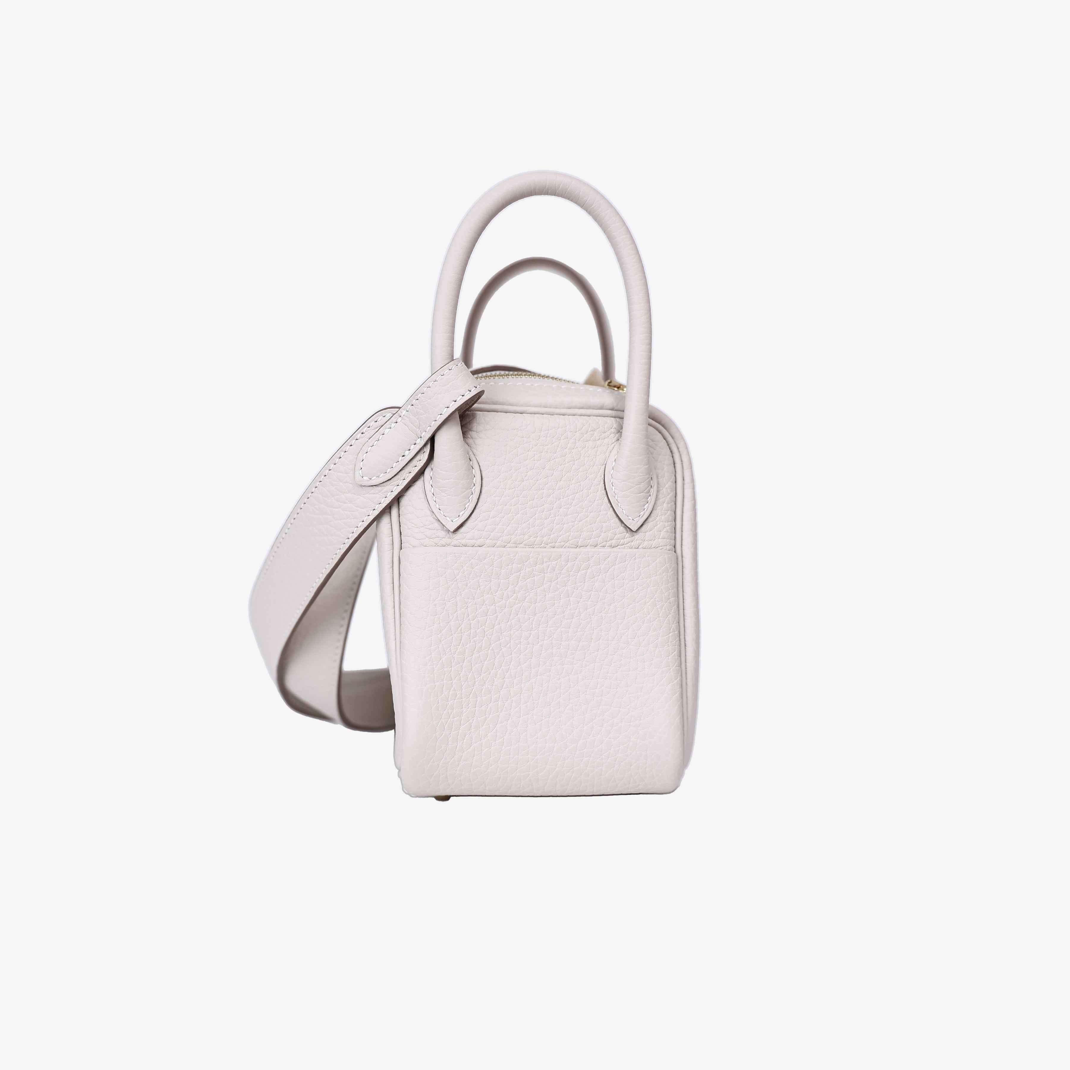 Hermès Mini Lindy in Craie Clemence Leather with Gold Hardware side view