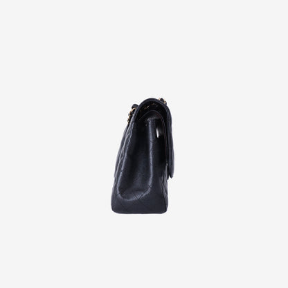 Chanel Jumbo Classic Flap Bag in Black Caviar Leather with Gold Hardware