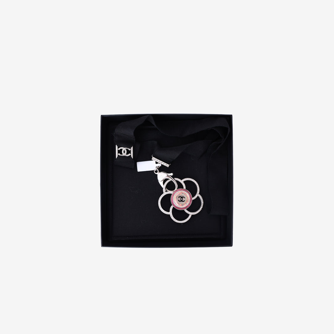 Chanel Camellia Pendant Necklace in Black Grosgrain Ribbon with Crystal Detailing and Silver Hardware front view