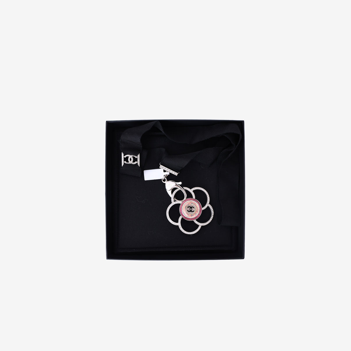 Chanel Camellia Pendant Necklace in Black Grosgrain Ribbon with Crystal Detailing and Silver Hardware front view