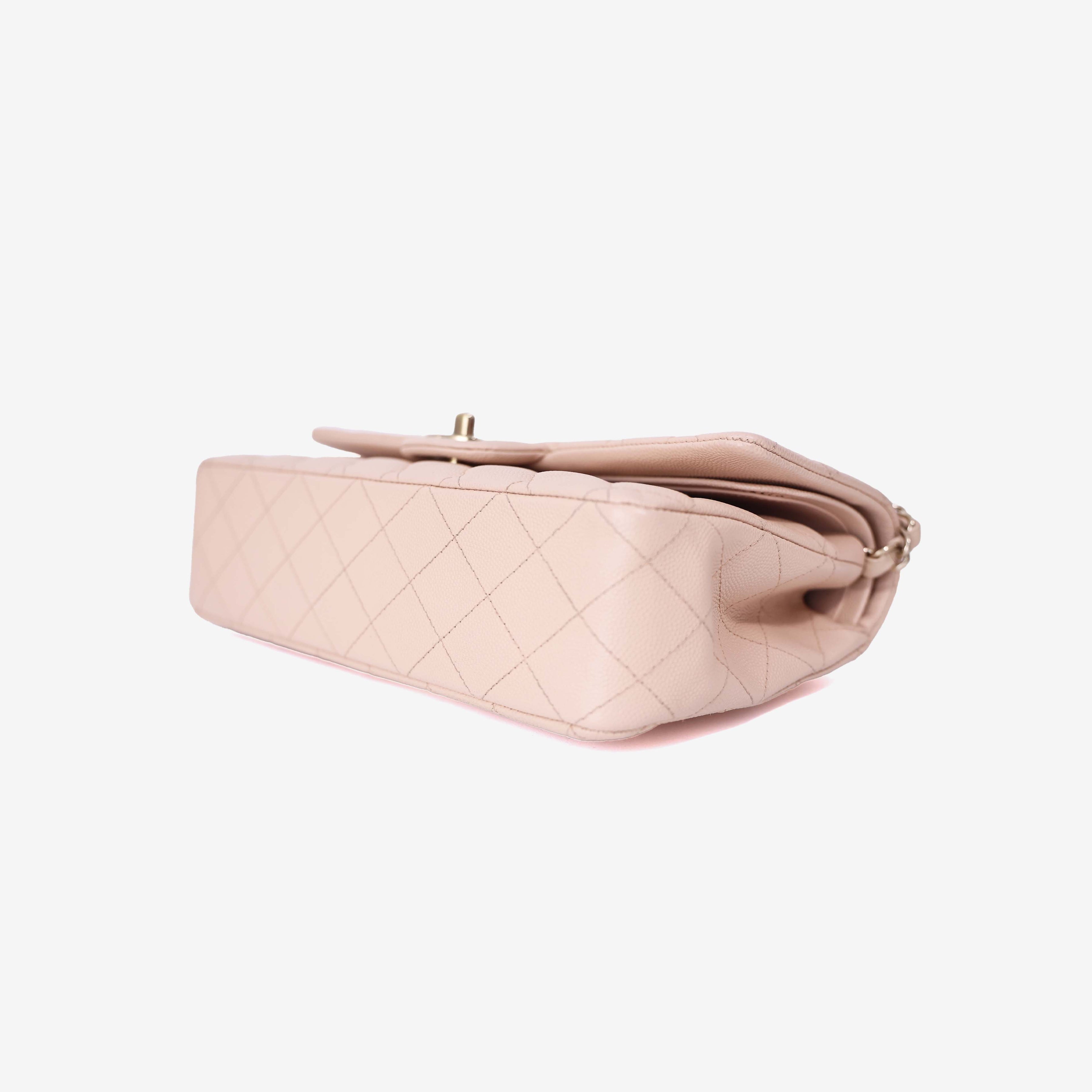 Chanel Classic Double Flap Medium Bag in Beige Clair Caviar Leather with Gold Hardware bottom side view