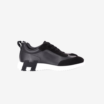 Hermès Bouncing Sneakers in Noir Calfskin and Suede Goatskin side view