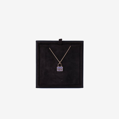 Hermès Amulettes Constance Pendant in Rose Gold with Blue Sapphires front view