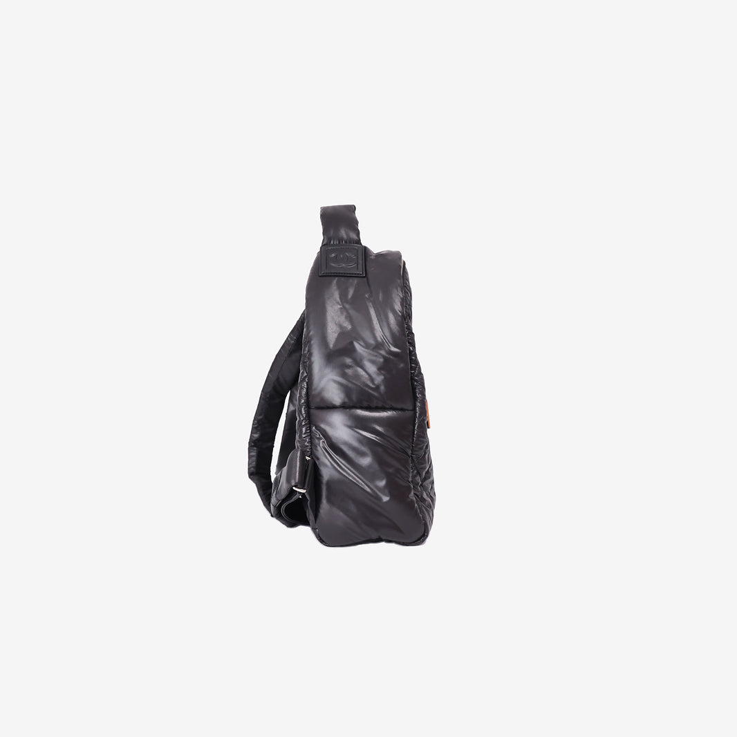 Chanel Coco Cocoon Quilted Backpack in Black Nylon with Palladium Hardware side view