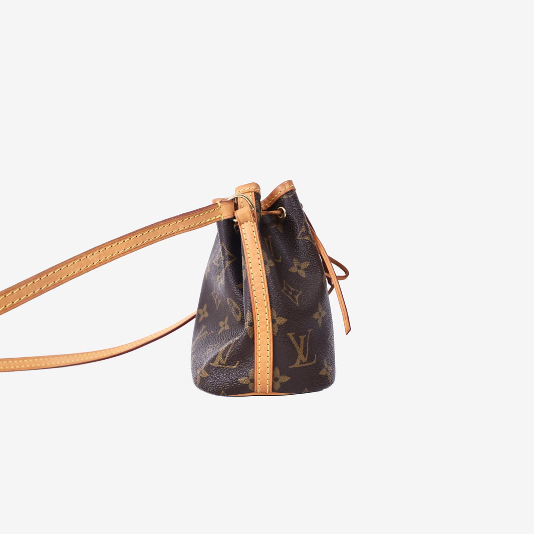 Louis Vuitton Nano Noé Bucket Bag in Monogram Coated Canvas with Vachetta Leather and Gold Hardware