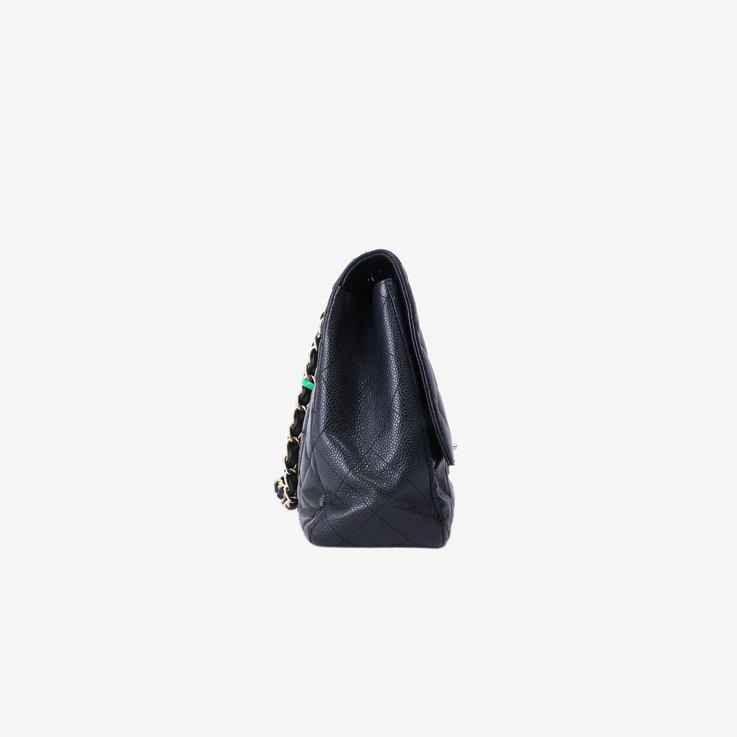 Chanel Jumbo Classic Flap Bag in Black Caviar Leather with Gold Hardware