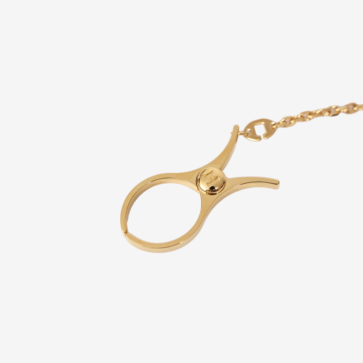 Hermès Filou Glove Clip in Gold-Plated Metal front view