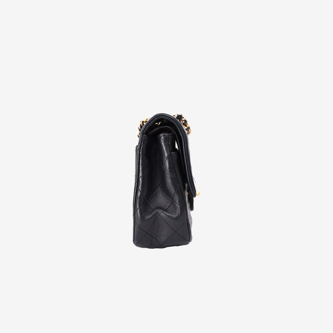 Chanel Vintage Classic Flap Bag in Black Lambskin Leather with Gold Hardware side view