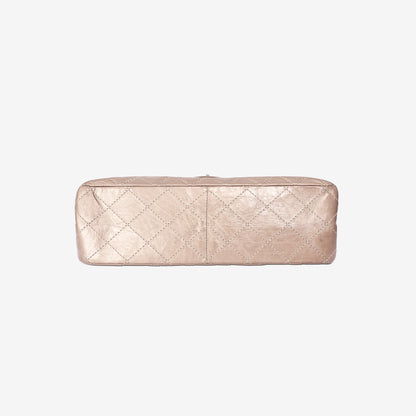 Chanel 2.55 Reissue Maxi Double Flap Bag in Metallic Champagne Lambskin Leather with Ruthenium Hardware