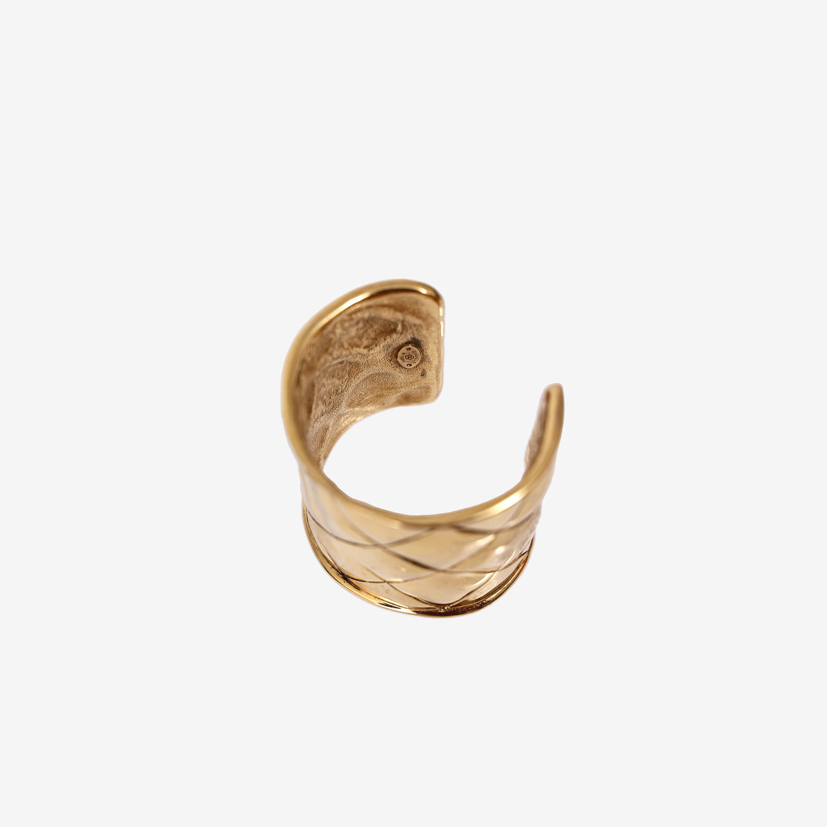 Chanel Vintage Quilted Cuff Bracelet in Gold-Tone Metal (Circa 1980) detail view