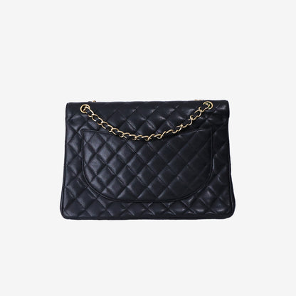 Chanel Maxi Classic Double Flap Bag in Black Caviar Leather with Gold Hardware