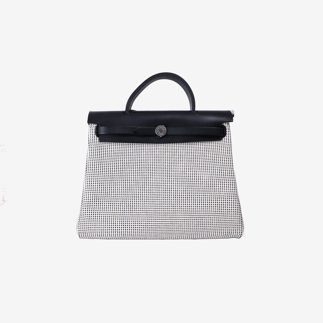 Hermès Herbag Zip 31 in Black/White Quadrille Canvas and Vache Hunter Leather with Palladium-Plated Hardware