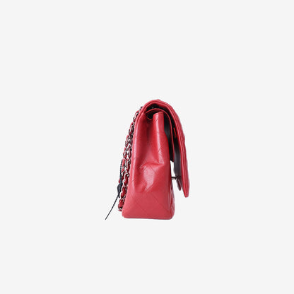 Chanel Classic Maxi Flap Bag in Red Caviar Leather with Silver Hardware