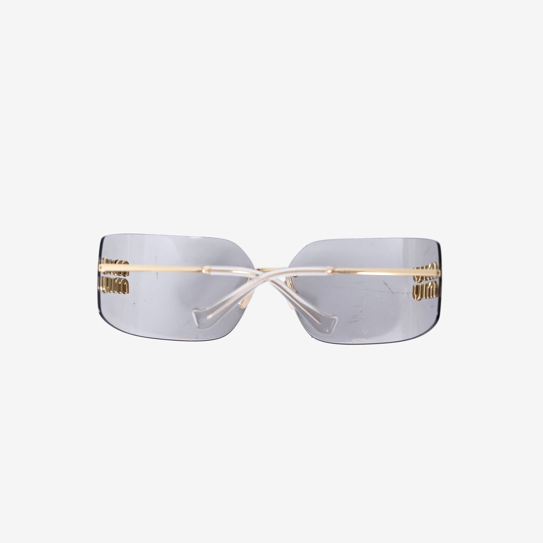 Miu Miu 54YS Rimless Sunglasses in Dark Grey with Gold-Tone Hardware
