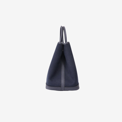 Hermès Garden Party 30 in Bleu Indigo Negonda Leather and Toile Canvas with Palladium Hardware side view