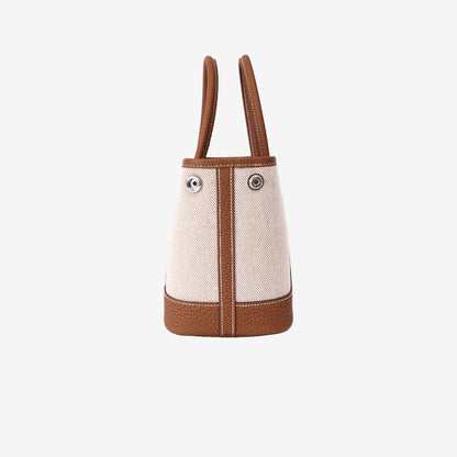 Hermès Neo Garden Party 23 Mini in Ecru, Beige and Ébène Negonda Leather and Canvas side view