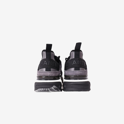 Chanel 23K CC Logo Sneakers in Grey and Black Suede with Gold Logo Detail (Size 41.5)
