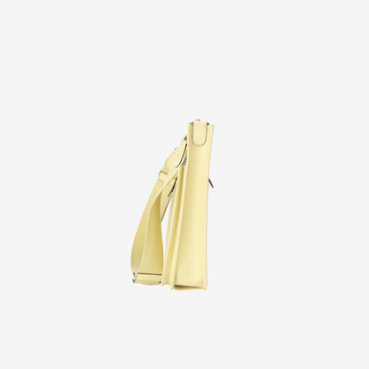 Hermès Evelyne 29 in Jaune Poussin Epsom Leather with Palladium Hardware side view