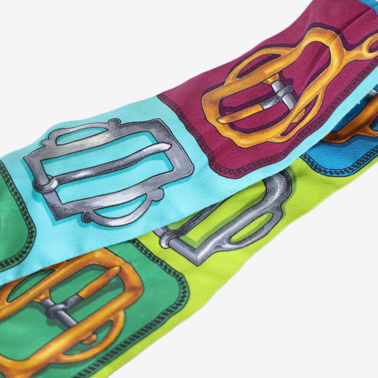 Hermès Bouclerie d’Attelage Twilly in Multicolour Silk detail view