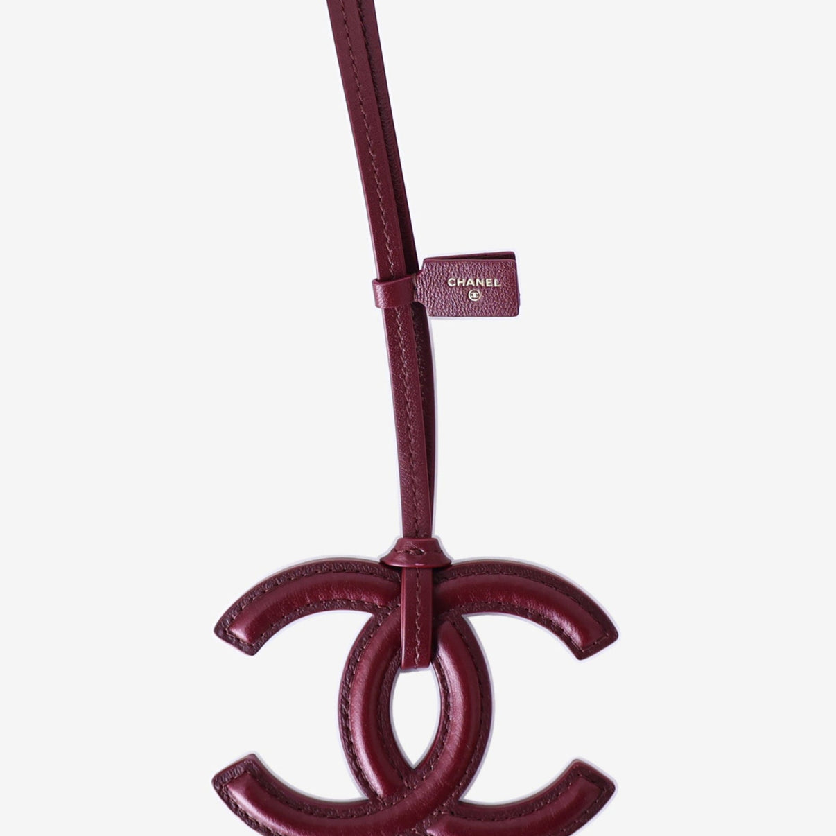 Chanel SS26 CC Logo Mini Bag Charm in Dark Burgundy Lambskin Leather with Gold Hardware detail view