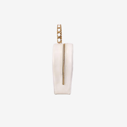 Chanel Vintage Heart-Shaped Vanity Bag in White Patent Leather with Gold Hardware side view