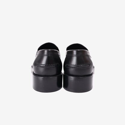 Hermès Hot Loafers in Noir Calfskin Leather with Palladium Kelly Buckle (Size 38.5)