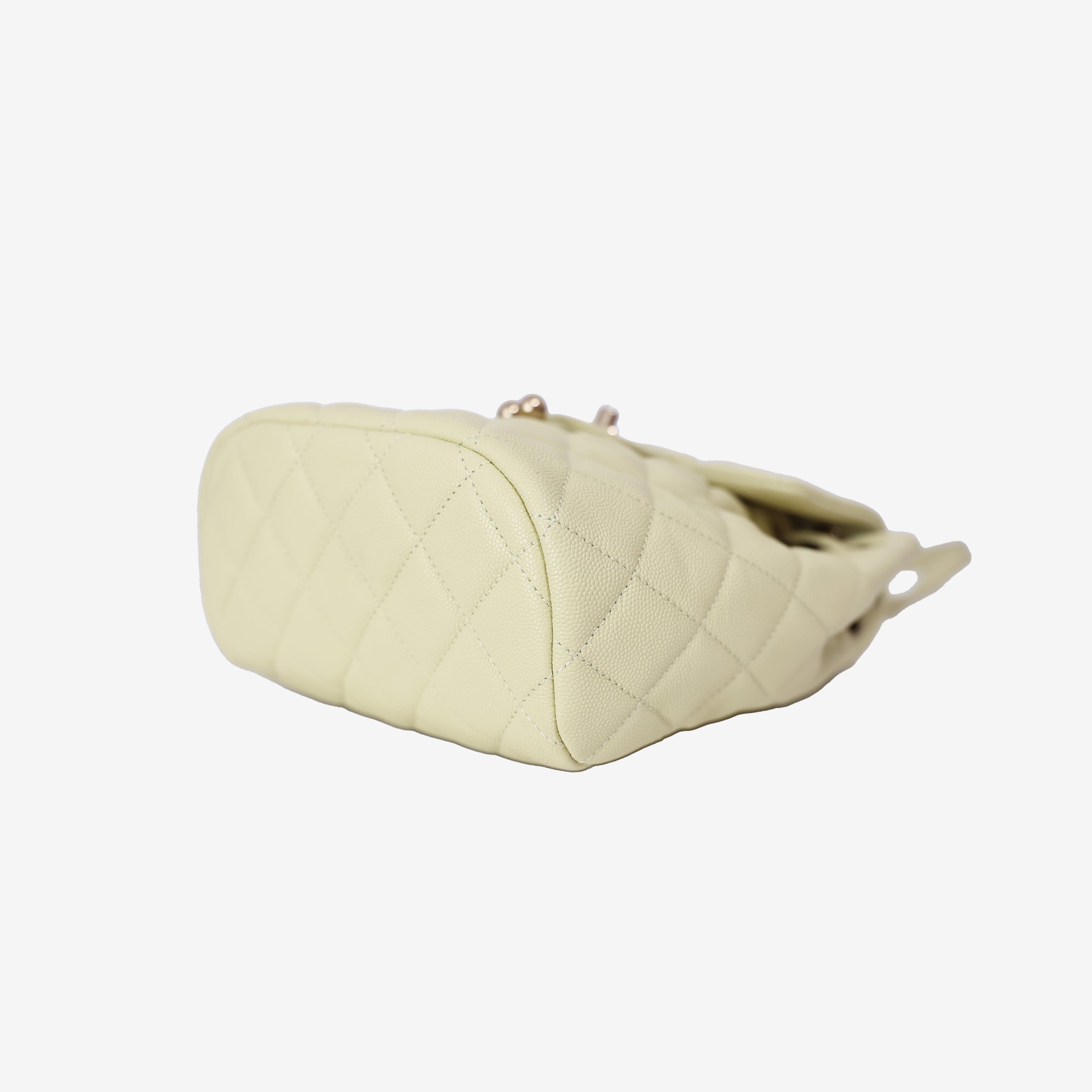 Chanel Urban Spirit Mini Backpack in Light Yellow Caviar Leather with Silver Hardware bottom side view