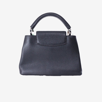 Louis Vuitton Capucines Handbag in Black Taurillon Leather with Silver Hardware