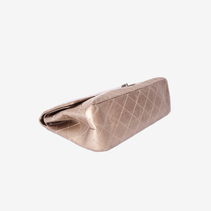 Chanel 2.55 Reissue Maxi Double Flap Bag in Metallic Champagne Lambskin Leather with Ruthenium Hardware