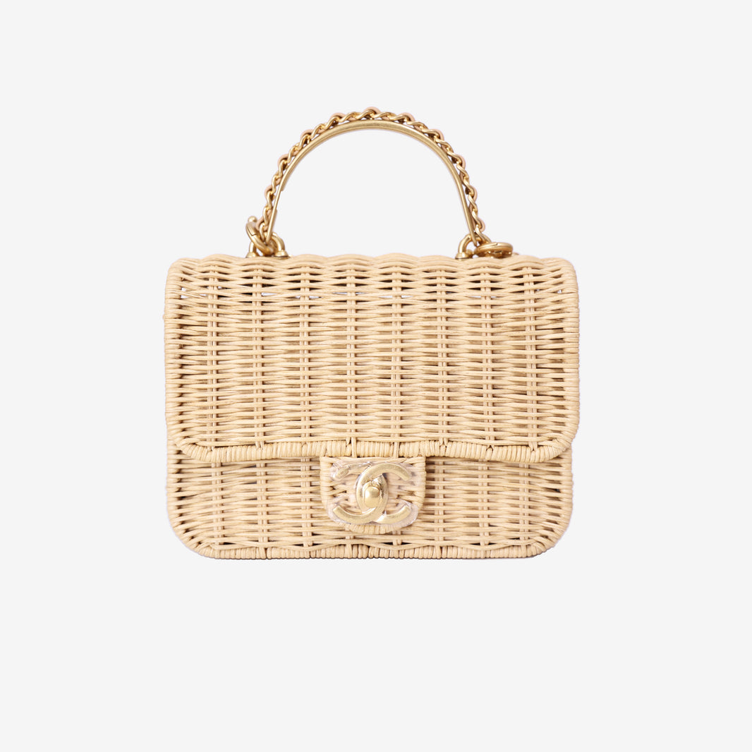 Chanel Mini Flap Bag with Top Handle in Beige Braided Rattan with Gold Hardware front view