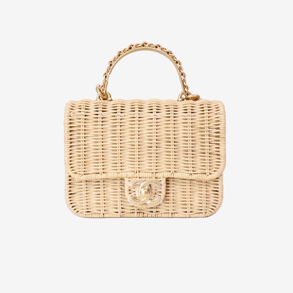 Chanel Mini Flap Bag with Top Handle in Beige Braided Rattan with Gold Hardware front view