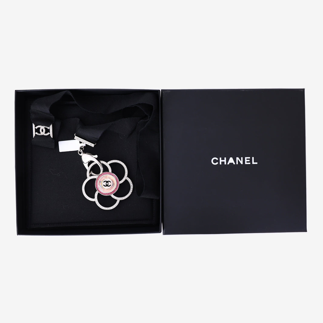 Chanel Camellia Pendant Necklace in Black Grosgrain Ribbon with Crystal Detailing and Silver Hardware detail view