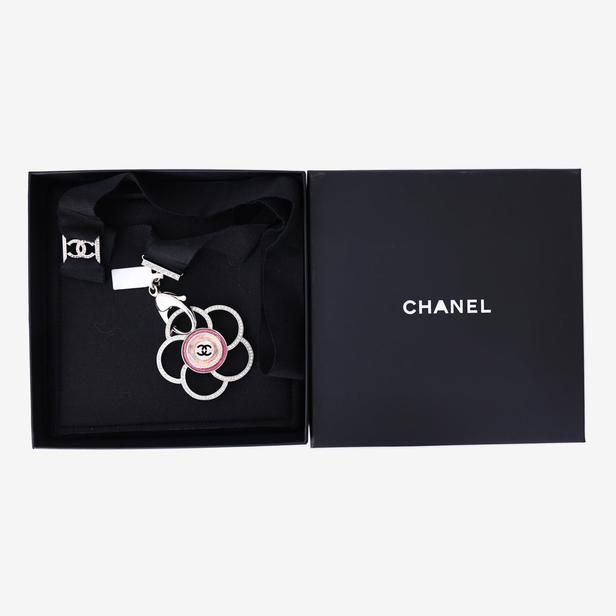 Chanel Camellia Pendant Necklace in Black Grosgrain Ribbon with Crystal Detailing and Silver Hardware detail view