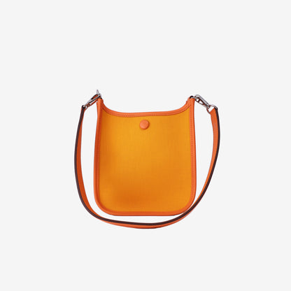 Hermès Neo Evelyne TPM in Feu/Jaune d'Or Officier Canvas/Swift Leather with Palladium Hardware
