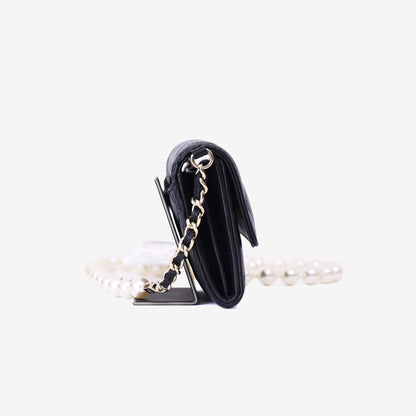 Chanel Wallet on Pearl Chain Card Holder in Black Lambskin Leather with Gold Hardware side view
