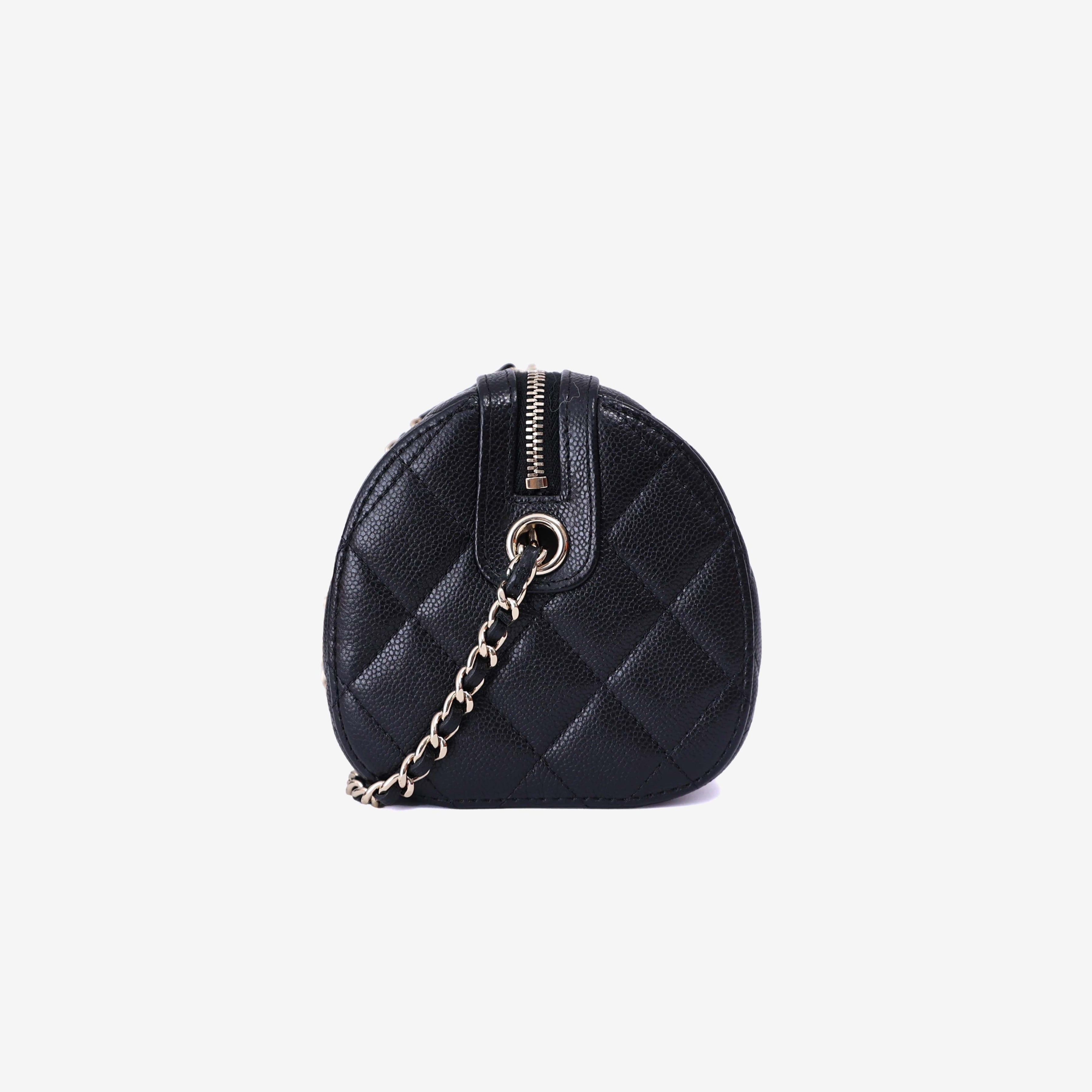 Chanel Classic Barrel Bag Mini in Black Caviar Leather with Gold Hardware side view