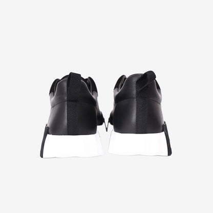 Hermès Bouncing Sneakers in Noir Calfskin and Suede Goatskin back view