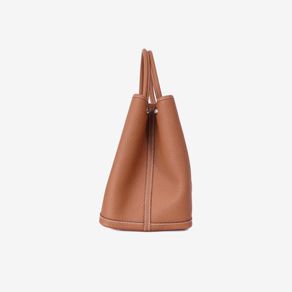 Hermès Garden Party 36 in Gold Negonda Leather with Palladium Hardware side view