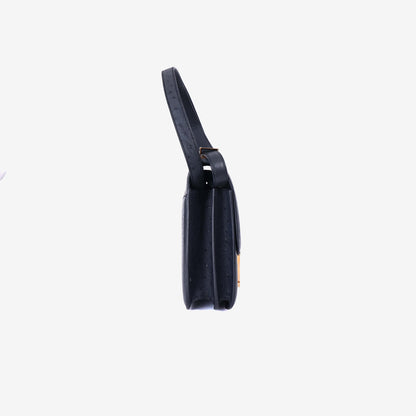 Hermès Constance 24 in Noir Ostrich Leather with Gold Hardware side view