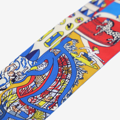 Hermès Exposition Universelle Twilly in Rouge/Blue Electric/Gold Silk detail view