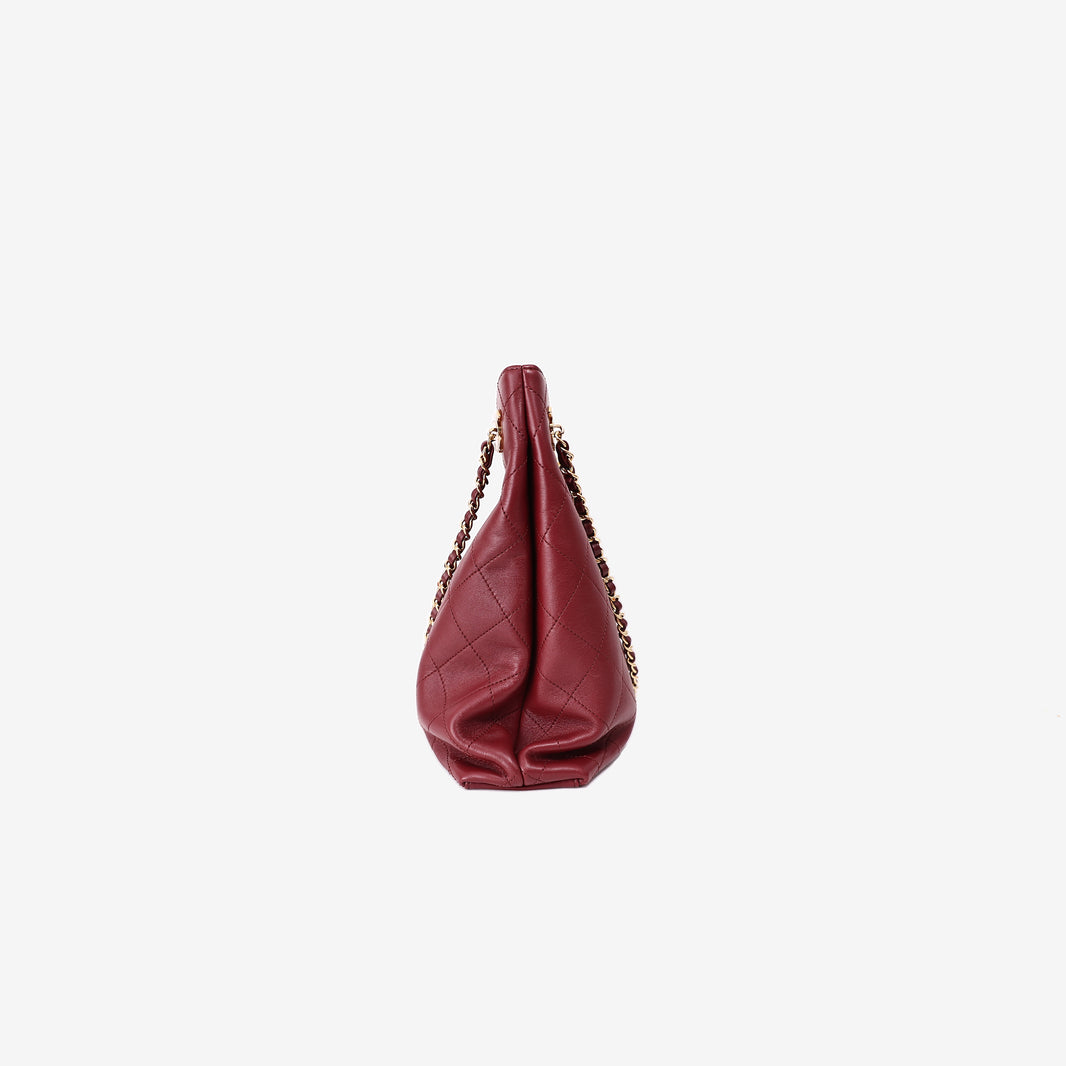 Chanel Large Shopping Bag in Burgundy Lambskin Leather with Gold Hardware (SS26) side view