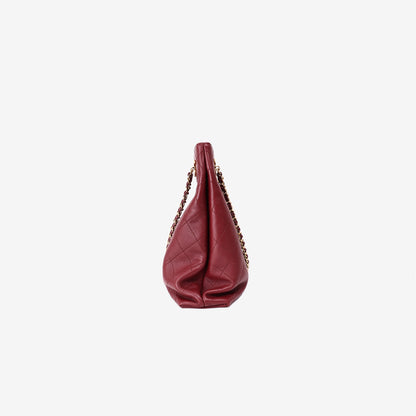 Chanel Large Shopping Bag in Burgundy Lambskin Leather with Gold Hardware (SS26) side view