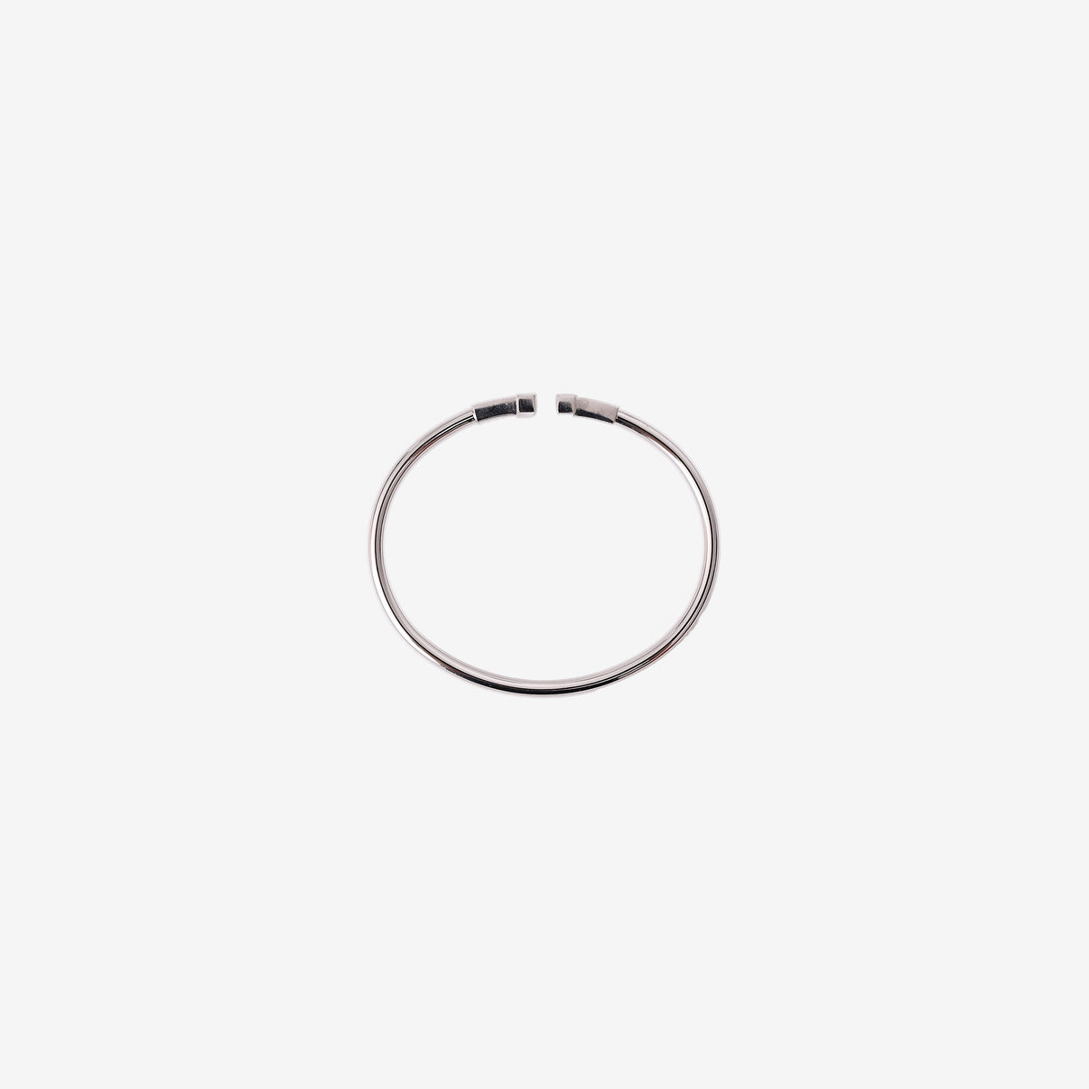 Tiffany & Co. T Wire Bracelet in 18k White Gold with Turquoise and Diamonds detail view