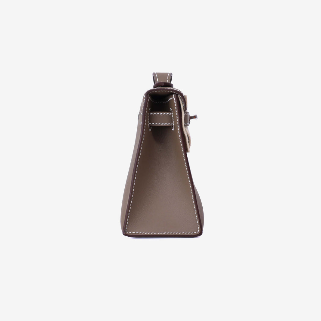 Hermès Kelly Pochette in Etoupe Swift Leather with Palladium Hardware side view