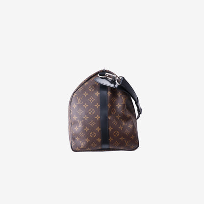 Louis Vuitton Keepall Bandoulière 55 in Monogram Macassar Coated Canvas with Black Leather and Silver Hardware