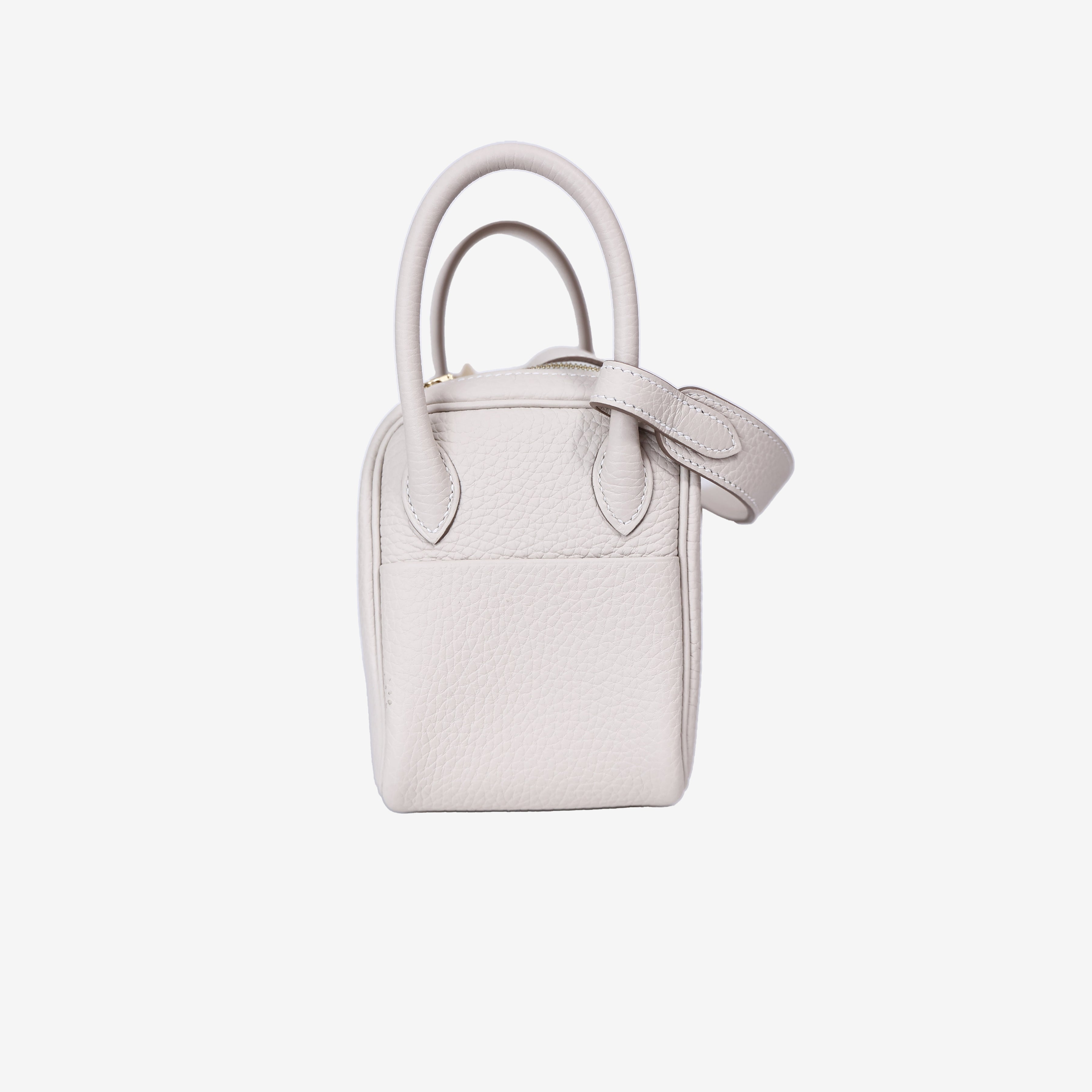 Hermès Mini Lindy in Craie Clemence Leather with Gold Hardware side view