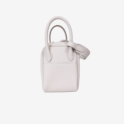 Hermès Mini Lindy in Craie Clemence Leather with Gold Hardware side view