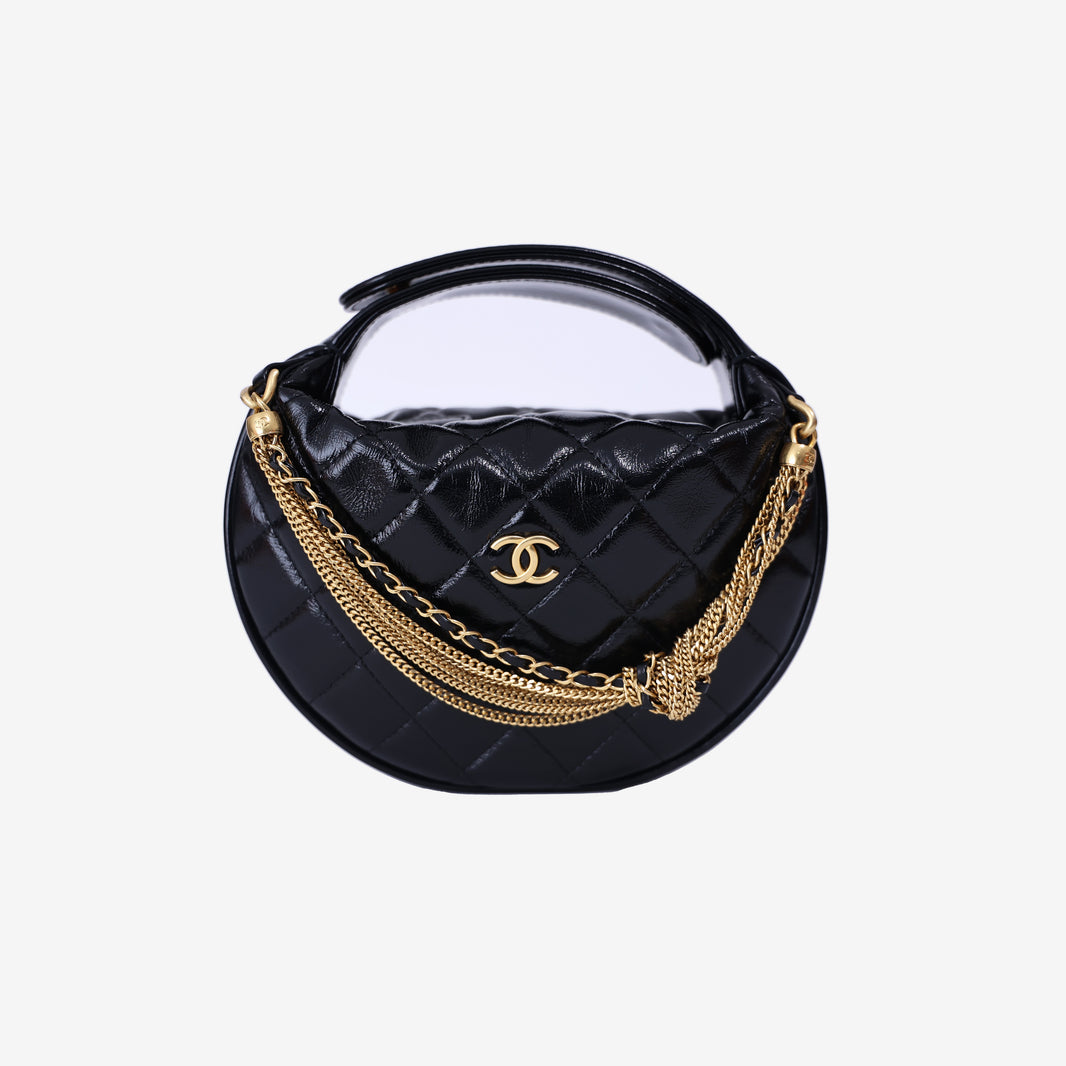 Chanel Mini Bow Hobo Pouch in Black Calfskin Leather with Gold Hardware front view